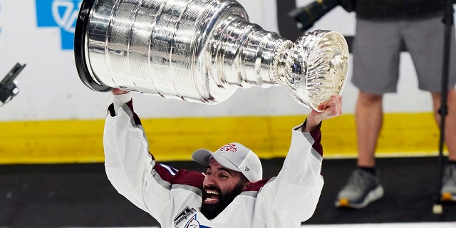 Colorado Avalanche star Nazem Kadri lifts the Stanley Cup after the team defeated the Tampa Bay Lightning 2-1 in Game 6 of the NHL hockey Stanley Cup Finals on Sunday, June 26, 2022, in Tampa, Fla.