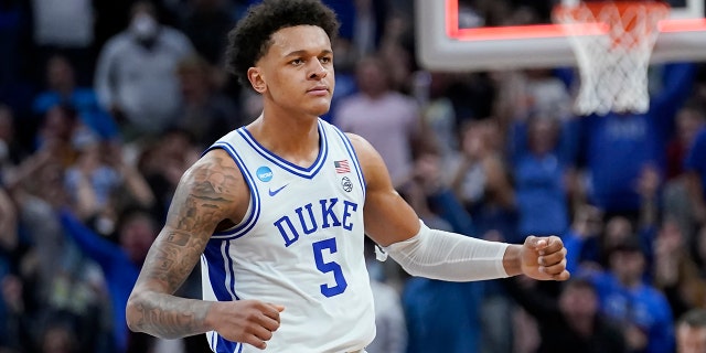 Duke forward Paolo Banchero celebrates during the first half of the team's game against Arkansas in the NCAA men's basketball tournament in San Francisco, March 26, 2022.
