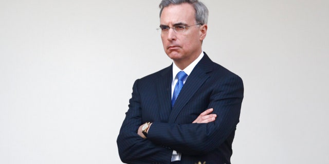 White House counsel Pat Cipollone listens as President Donald Trump speaks during a coronavirus task force briefing at the White House, March 29, 2020. 