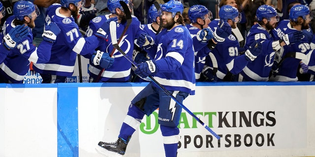 Tampa Bay Lightning left wing Pat Maroon (14) celebrates with teammates after scoring a goal against the New York Rangers during the first period in Game 4 of the NHL's Eastern Conference finals June 7, 2022, in Tampa, Fla. 