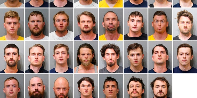 These booking images provided by the Kootenai County Sheriff’s Office show the 31 members of the white supremacist group Patriot Front who were arrested after they were found packed into the back of a U-Haul truck with riot gear near an LGBTQ pride event in Coeur d’Alene, Idaho, on Saturday, June 11, 2022. Top row, from left, are Jared Boyce, Nathan Brenner, Colton Brown, Josiah Buster, Mishael Buster, Devin Center, Dylan Corio, and Winston Durham. Second row, from left, are Garret Garland, Branden Haney, Richard Jessop, James Julius Johnson, James Michael Johnson, Connor Moran, Kieran Morris and Lawrence Norman. Third row, from left, are Justin O'leary, Cameron Pruitt, Forrest Rankin, Thomas Rousseau, Conor Ryan, Spencer Simpson, Alexander Sisenstein and Derek Smith. Bottom row, from left, are Dakota Tabler, Steven Tucker, Wesley Van Horn, Mitchell Wagner, Nathaniel Whitfield, Graham Whitsom and Robert Whitted. 