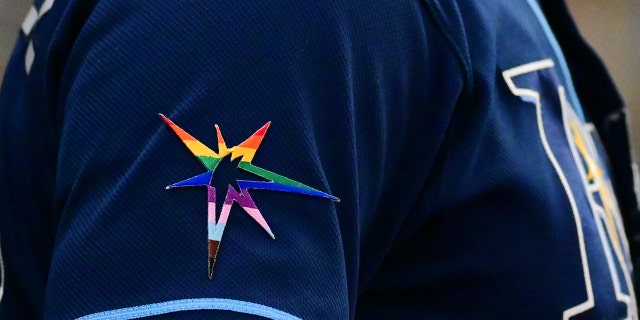 The Tampa Bay Rays pride burst logo celebrating Pride Month during a game against the Chicago White Sox at Tropicana Field June 4, 2022, in St Petersburg, Fla.