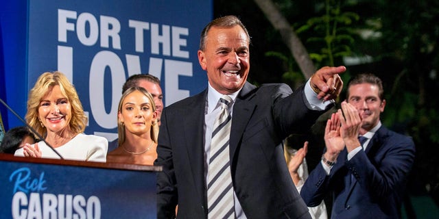 Rick Caruso, a Democratic candidate for Los Angeles mayor, celebrates at his primary-night gathering in Los Angeles, Tuesday, June 7, 2022, with his family behind him. 