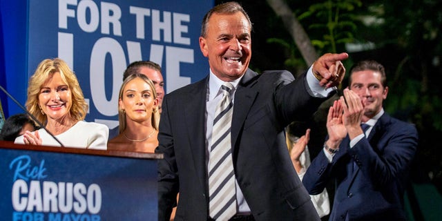 Rick Caruso, a Democratic candidate for Los Angeles mayor, celebrates at his primary-night gathering in Los Angeles, Tuesday, June 7, 2022, with his family behind him. 