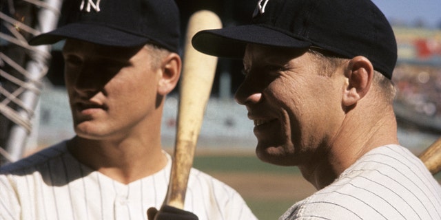 Yankees Roger Maris and Mickey Mantle stand