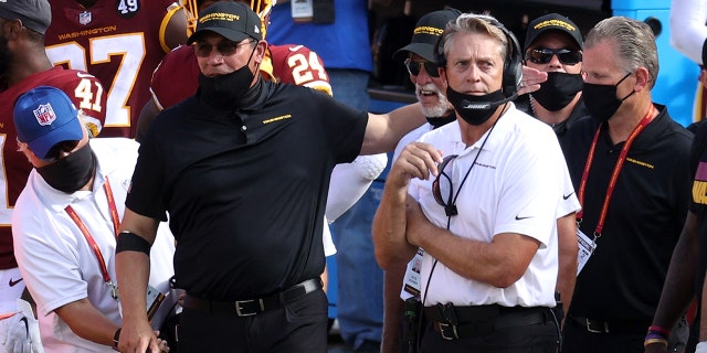 Head coach Ron Rivera (L) of the Washington Football Team and defensive coordinator Jack Del Rio celebrate in the closing seconds of their win against the Philadelphia Eagles in the second half at FedExField on Sept. 13, 2020 in Landover, Maryland. 