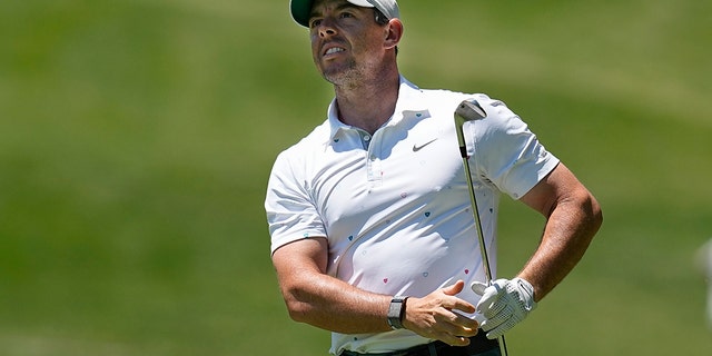 Rory McIlroy of Northern Ireland watches his shot from the first fairway during the third round of the Memorial Golf Tournament on June 4, 2022 in Dublin, Ohio.