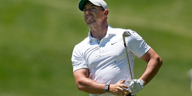 Rory McIlroy of Northern Ireland watches his shot from the first fairway during the third round of the Memorial golf tournament June 4, 2022, in Dublin, Ohio.