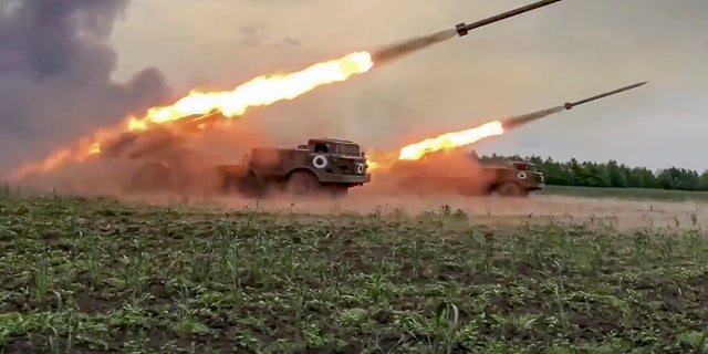 In this handout photo released by Russian Defense Ministry Press Service released on Wednesday, June 1, the Russian military's Uragan multiple rocket launchers fire rockets at Ukrainian troops at an undisclosed location. 