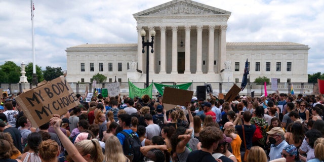 Abortion-rights protesters gather outside the Supreme Court in Washington, Friday, June 24, 2022. 