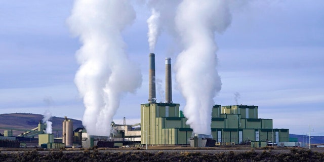 FILE - Steam billows from a coal-fired power plant Nov. 18, 2021, in Craig, Colo. The Supreme Court on Thursday, June 30, 2022, limited how the nation’s main anti-air pollution law can be used to reduce carbon dioxide emissions from power plants. 