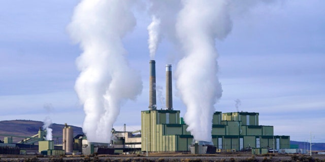 FILE - Steam billows from a coal-fired power plant Nov. 18, 2021, in Craig, Colo. The Supreme Court on Thursday, June 30, 2022, limited how the nation’s main anti-air pollution law can be used to reduce carbon dioxide emissions from power plants. By a 6-3 vote, with conservatives in the majority, the court said that the Clean Air Act does not give the Environmental Protection Agency broad authority to regulate greenhouse gas emissions from power plants that contribute to global warming. 