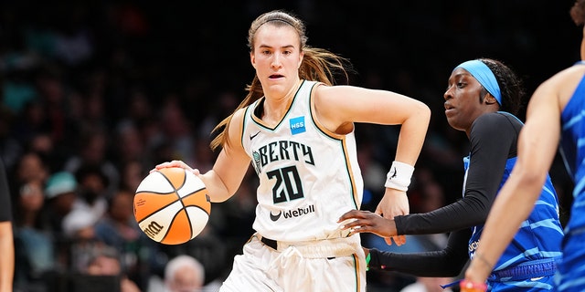 Sabrina Ionescu (20) of the New York Liberty dribbles during a game against the Chicago Sky on June 12, 2022 at Barclays Center in Brooklyn.