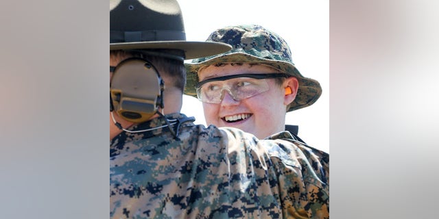 After going through the two days of boot camp, Sam was given his Eagle, Globe and Anchor, the emblem of the U.S. Marine Corps — and was named an honorary Marine.