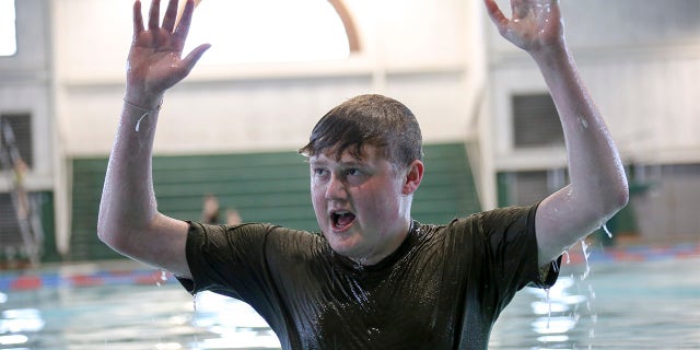 Sam is pictured during the swim qualifications portion of boot camp.