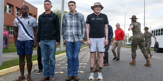 Sam (at right, wearing hat) arrived at Parris Island in S.C. on April 27. He was joined by seven Marines who went through Sam's boot camp with him as other "recruits."
