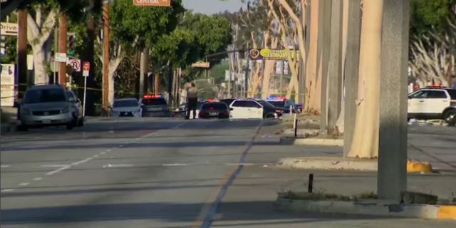 Police investigate after two El Monte Police Department officers were shot Tuesday.