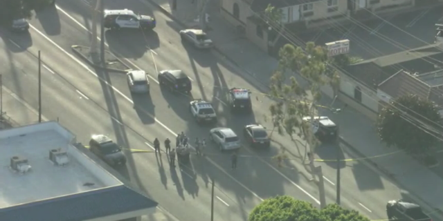 Police investigate after two El Monte Police Department officers were shot Tuesday.