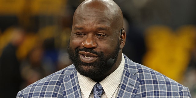 NBA television analyst Shaquille O'Neal smiles on the set before Game One of the 2022 NBA Finals between the Boston Celtics and the Golden State Warriors on June 2, 2022 at the Chase Center in San Francisco.