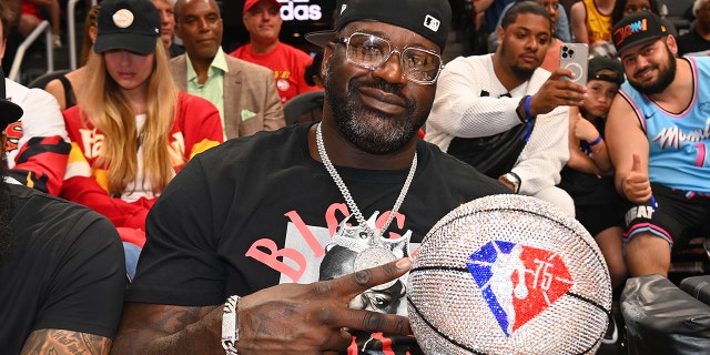Shaquille O'Neal attends Game Three of the Eastern Conference First Round between the Miami Heat and the Atlanta Hawks at State Farm Arena on April 22, 2022 in Atlanta, Georgia.