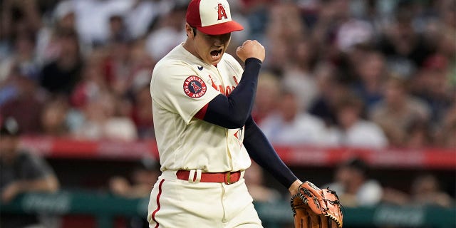 Los Angeles Angels starting pitcher Shohei Ohtani reacts after striking out Chicago White Sox's Josh Harrison to end the top of the fourth inning of a baseball game Wednesday, June 29, 2022, in Anaheim, Calif.