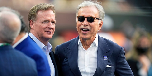 NFL Commissioner Roger Goodell, left, on the field with Los Angeles Rams owner Stan Kroenke before the NFL Super Bowl LVI football game at SoFi Stadium in Inglewood, on Sunday, February 13, 2022.