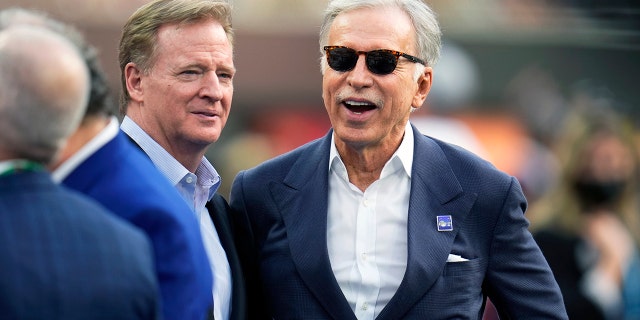 NFL Commissioner Roger Goodell, left, on the field with Los Angeles Rams owner Stan Kroenke before the NFL Super Bowl LVI football game at SoFi Stadium in Inglewood, on Sunday, February 13, 2022.