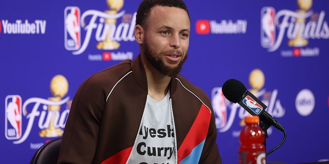 Stephen Curry #30 of the Golden State Warriors talks to the media after Game Five of the 2022 NBA Finals on June 13, 2022 at Chase Center in San Francisco, California.