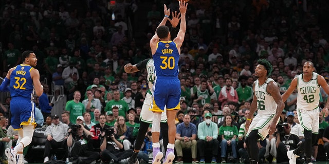 Stephen Curry #30 of the Golden State Warriors shoots a three point basket against the Boston Celtics during Game Six of the 2022 NBA Finals on June 16, 2022 at TD Garden in Boston, Massachusetts.