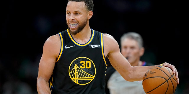 Tracy McGrady puts Stephen Curry's legacy into focus as Warriors star pursues 4th ring 3 Golden State Warriors guard Stephen Curry brings the ball up court against the Celtics June 8, 2022, in Boston.