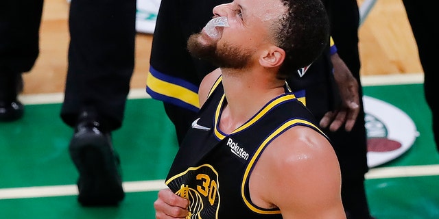 Golden State Warriors guard Stephen Curry reacts during NBA Finals against the Celtics, Wednesday, June 8, 2022, in Boston.