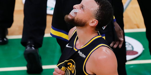 Golden State Warriors guard Stephen Curry reacts during NBA Finals against the Celtics, Wednesday, June 8, 2022, in Boston.