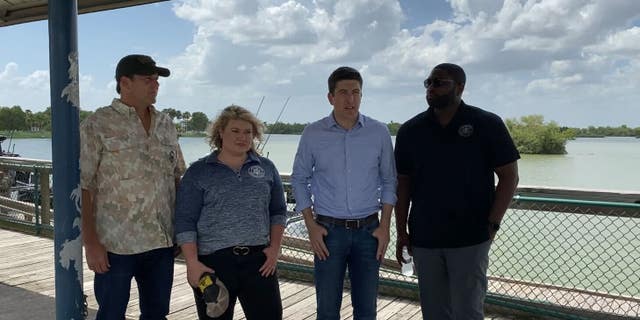Representatives Brian Stiel, R-Wis., Jodey Arrington, R-Texas, Kat Cammack, R-Fla., and Byron Donalds, R-Fla., speak to reporters after touring the Rio Grande with the Texas Department of Public Safety .