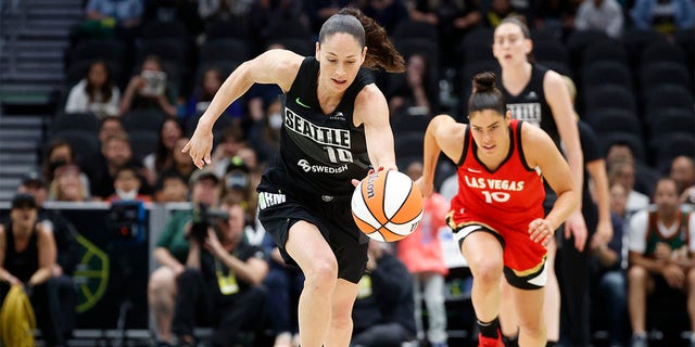 Sue Bird #10 of the Seattle Storm steals the ball from Kelsey Plum #10 of the Las Vegas Aces during the first half at Climate Pledge Arena on June 29, 2022 in Seattle, Washington. 