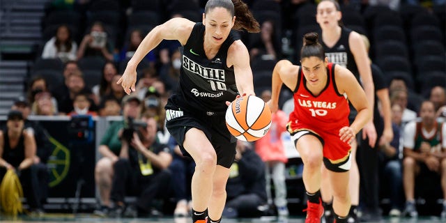 Sue Bird #10 of the Seattle Storm steals the ball from Kelsey Plum #10 of the Las Vegas Aces during the first half at Climate Pledge Arena on June 29, 2022 in Seattle, Washington.