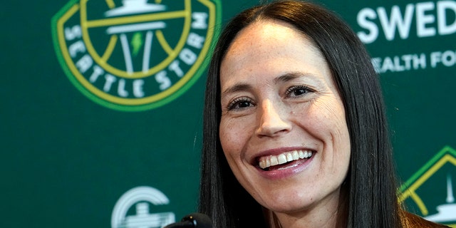 Storm guard Sue Bird smiles as she talks about her return for one more WNBA basketball season during a news conference on, Feb. 22, 2022, in Seattle.