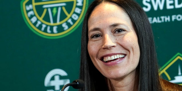 Storm guard Sue Bird smiles as she talks about her return for one more WNBA basketball season during a news conference on, Feb. 22, 2022, in Seattle.