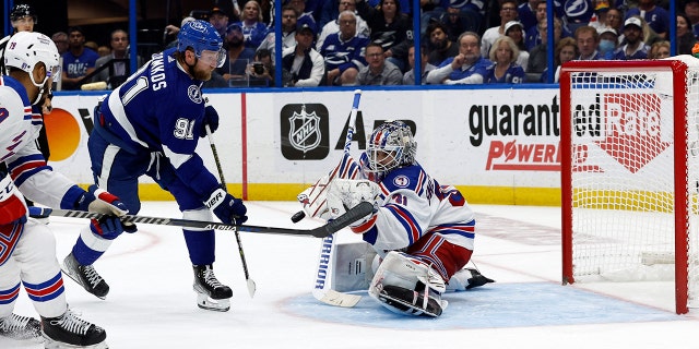 Jun 11, 2022; Tampa, Florida, USA;Tampa Bay Lightning center Steven Stamkos (91) scores against New York Rangers goaltender Igor Shesterkin (31) during the third period of game six of the Eastern Conference Final of the 2022 Stanley Cup Playoffs at Amalie Arena. Mandatory Credit: Kim Klement-USA TODAY Sports