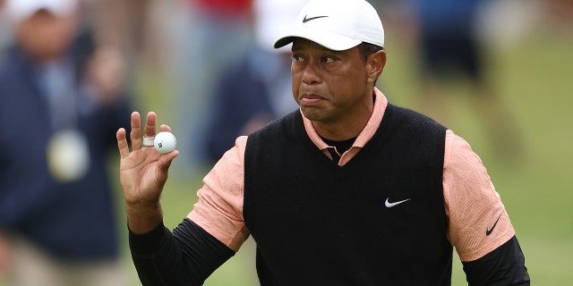 Tiger Woods reacts to his putt during the PGA Championship on May 21, 2022, in Tulsa, Oklahoma.