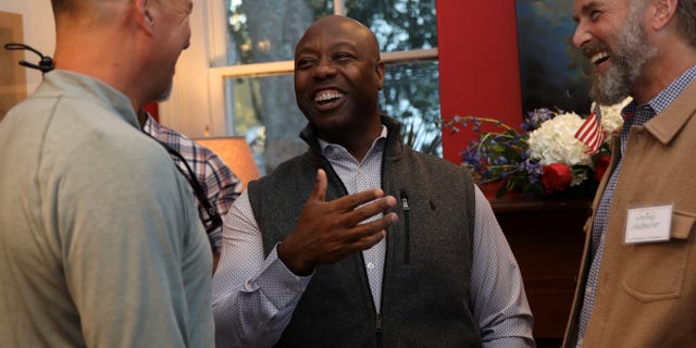 Sen. Tim Scott of South Carolina meets voters in Summerville, South Carolina, in November 2021. The Republican senator is running for reelection this year.