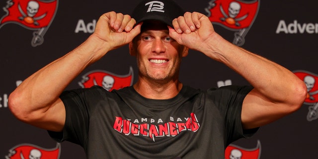 Tampa Bay Buccaneers quarterback Tom Brady participates in a press conference during mandatory minicamp at AdventHealth Training Center June 9, 2022, in Tampa, Fla.