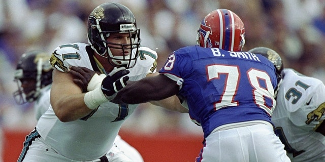 Jacksonville Jaguars' Tony Boselli # 71 faced Buffalo Bills' defensive end Bruce Smith # 78 during a match at Rich Stadium in Orchard Park, NY. Bills defeated the Jaguars 17-16.