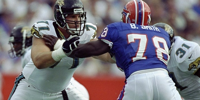 Jacksonville Jaguars' Tony Bocelli #71 in action in action against Buffalo Bills defensive end Bruce Smith #78 during a game at Rich Stadium in Orchard Park, New York.  The Bills defeated the Jaguars 17-16.