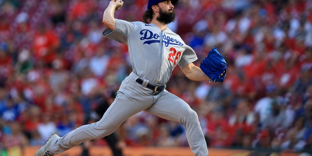 Los Angeles Dodgers' Tony Gonsolin throws during the first inning of a baseball game against the Cincinnati Reds in Cincinnati, Tuesday, June 21, 2022.