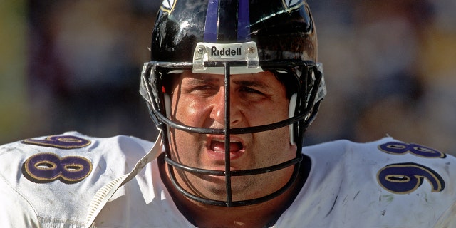 Defensive lineman Tony Siragusa #98 of the Baltimore Ravens looks on from the sideline during a game against the Pittsburgh Steelers at Heinz Field on Nov. 4, 2001 in Pittsburgh, Pennsylvania.  The Ravens defeated the Steelers 13-10. 