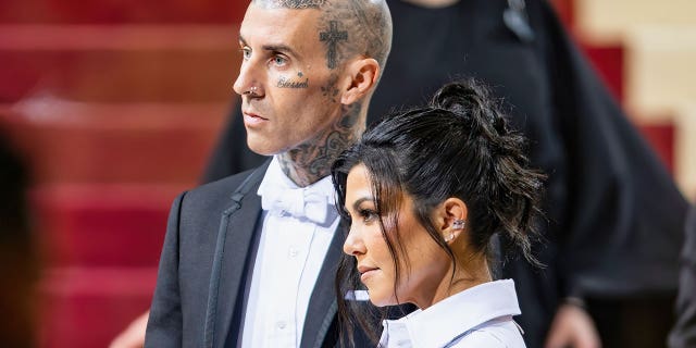 Travis Barker and Kourtney Kardashian arrive to The 2022 Met Gala Celebrating "In America: An Anthology of Fashion" at The Metropolitan Museum of Art on May 02, 2022, in New York City. He is now recovering from pancreatitis after an endoscopy damaged a critical pancreatic drainage tube. 