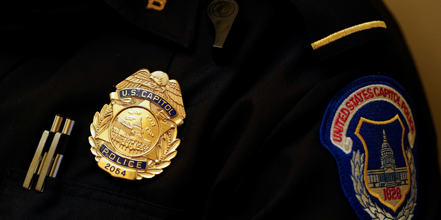 Unnamed U.S. senator contacted Capitol Police after allegedly receiving threatening voicemails. A U.S. Capitol Police badge is seen in Washington, D.C., on Jan. 5, 2022.
