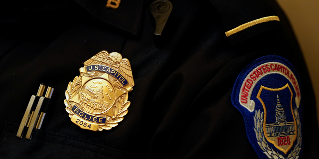 Unnamed U.S. senator contacted Capitol Police after allegedly receiving threatening voicemails. A U.S. Capitol Police badge is seen in Washington, D.C., on Jan. 5, 2022.