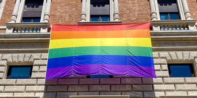 A rainbow Pride flag flies at the U.S. Embassy to the Holy See.