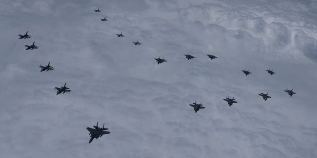 In this photo provided by South Korea Defense Ministry, U.S. and South Korea Air Force fighter jets including South Korea's F-35A stealth fighters – and U.S. F-16 fighter jets, fly in formation during a joint drill on Tuesday, June, 7, 2022.